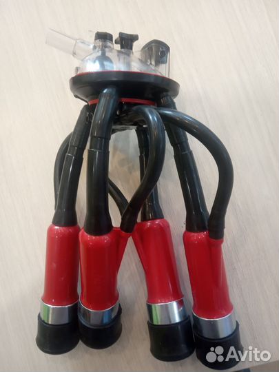 Подвесная часть доильного аппарата для коров