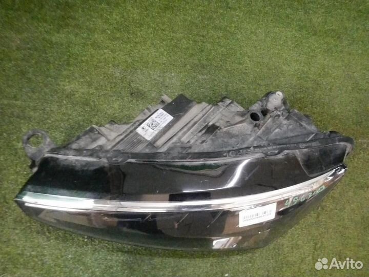 Фара левая Skoda Rapid