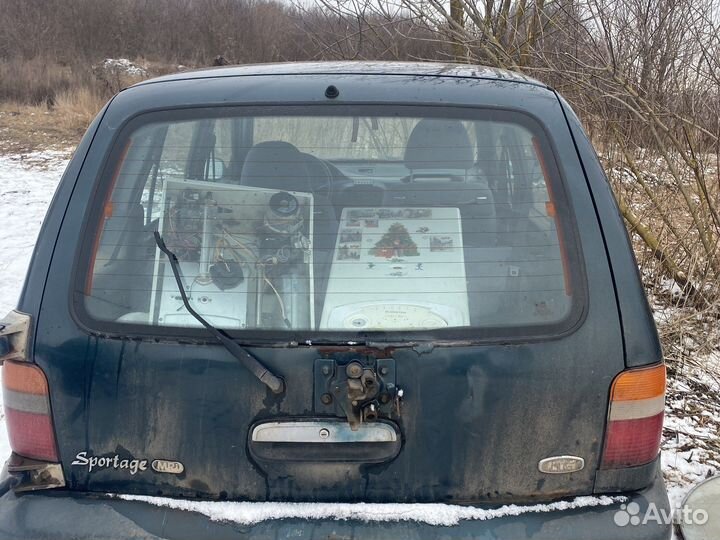 Крышка багажника kia sportage 1