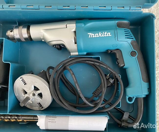 Ударная дрель Makita HP2050