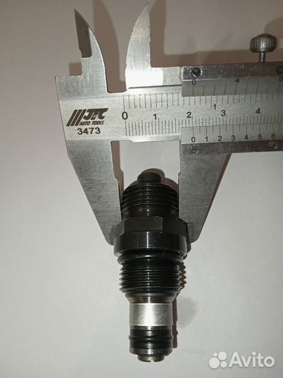 Клапан гидравлический для автомобильного подъемник