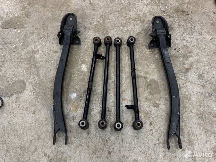 Задние рычаги Subaru Forester SG