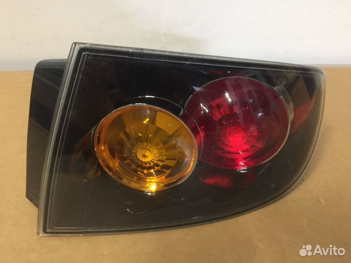 Фонарь задний левый внешний Mazda 3
