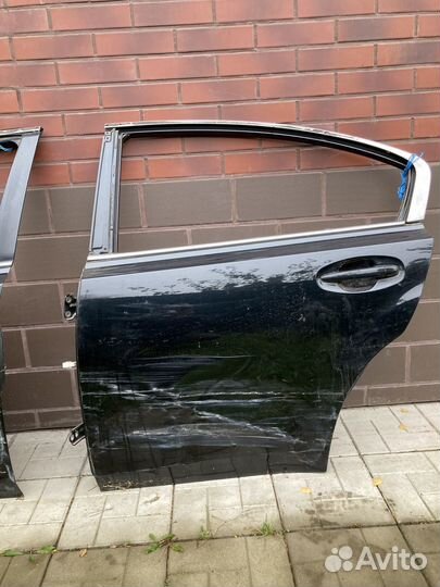 Двери на legacy седан bm 2010