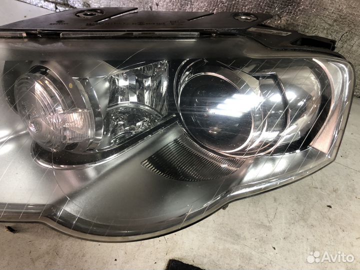 Передняя левая фара Volkswagen Passat B6