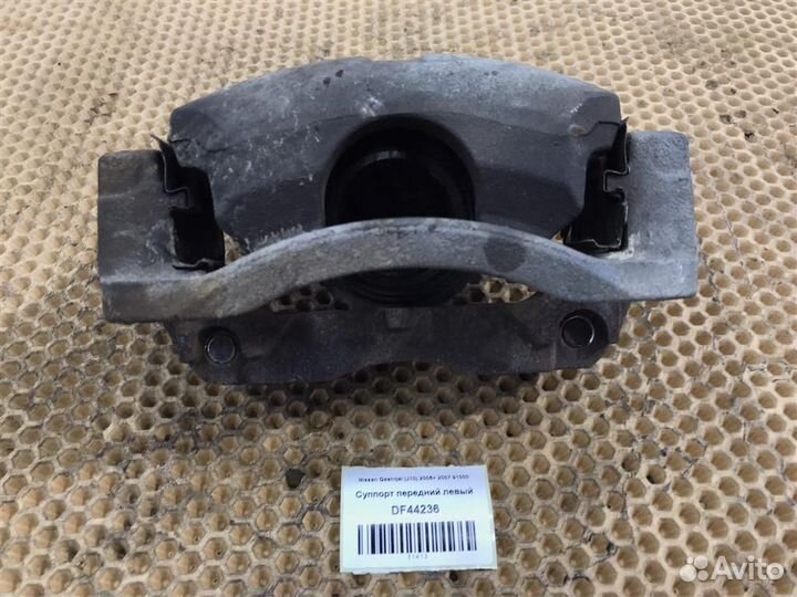 Суппорт передний левый Nissan Qashqai (J10) 2006
