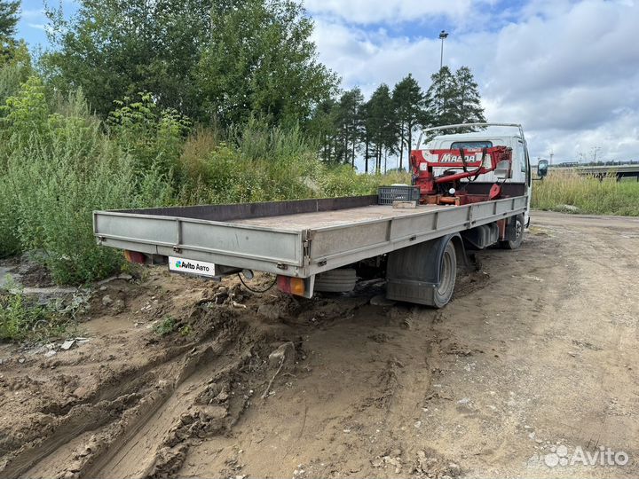 Бортовой грузовик Isuzu Elf, 2001