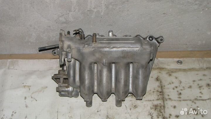 Коллектор впускной Митсубиси Каризма