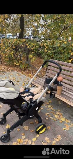 Коляска автокресло doona с базой isofix