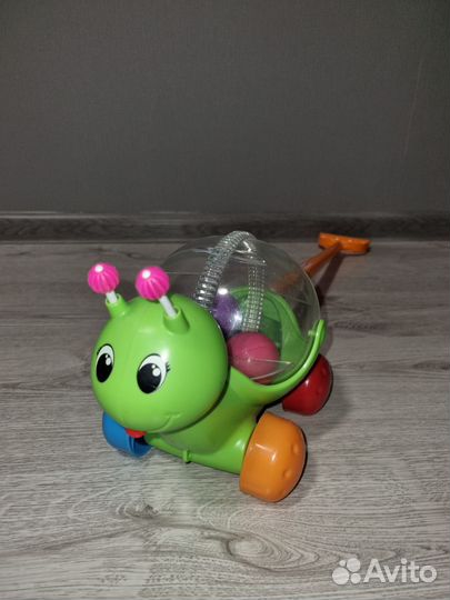 Игрушка каталка с ручкой