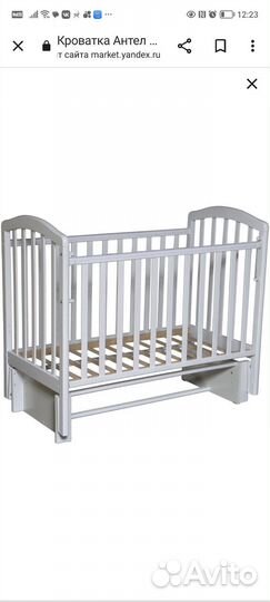 Детская кроватка с маятником