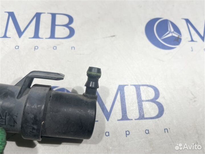 Форсунка омывателя фары передняя правая