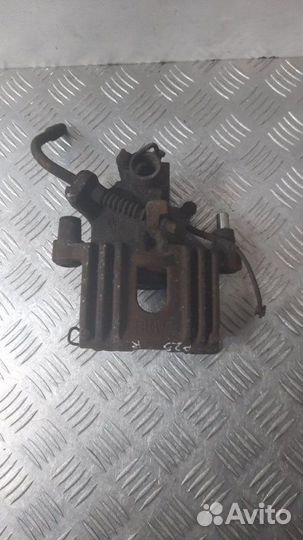 Суппорт тормозной задний правый Mini Cooper