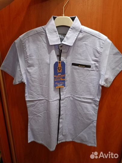 Рубашка для мальчика новая 134