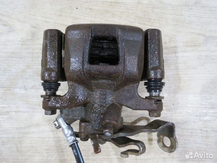 Суппорт тормозной задний левый Mazda 6 GJ