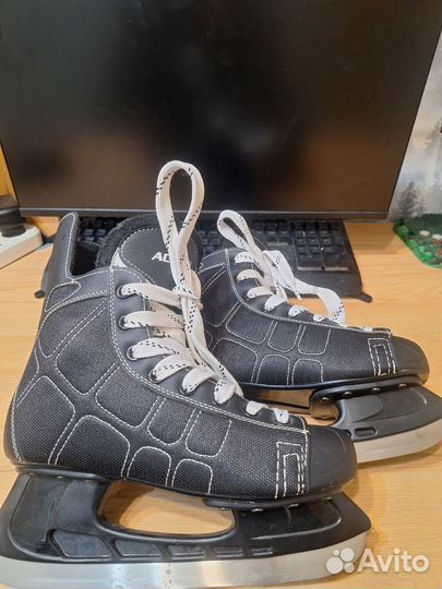Коньки хоккейные action 38