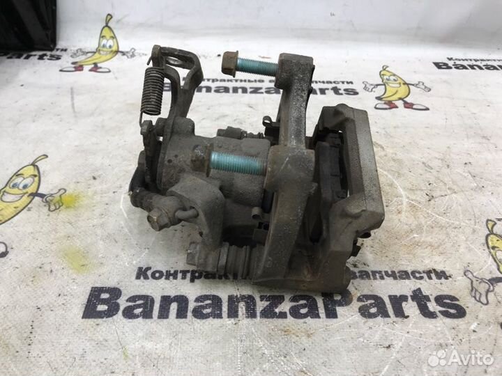 Суппорт тормозной задний левый Mazda Cx-5 KE