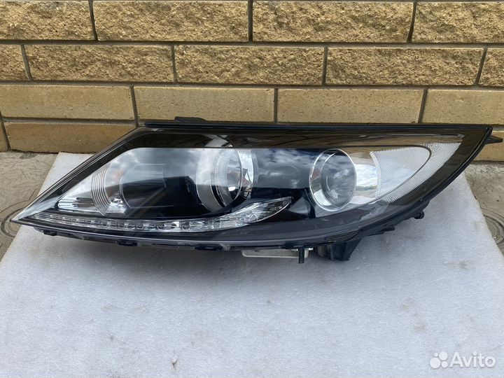 Фара ксенон левая KIA Sportage 3 дхо LED