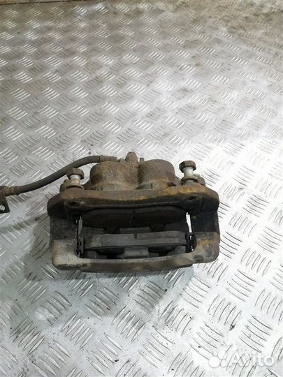 Суппорт тормозной передний левый Ssangyong Actyon