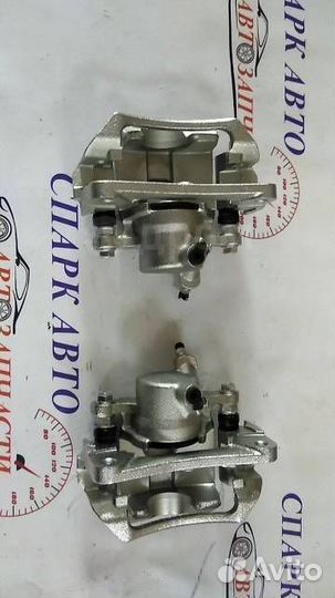 Суппорт задний левый/правый Toyota Land Cruiser 10