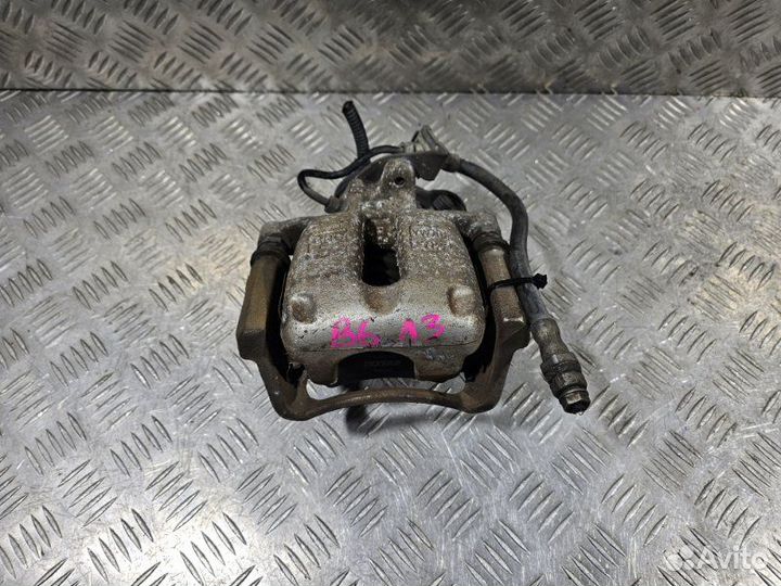 Суппорт задний левый Volkswagen Passat B6