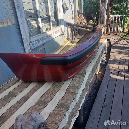 Задний бампер Mitsubishi carisma 2002 г