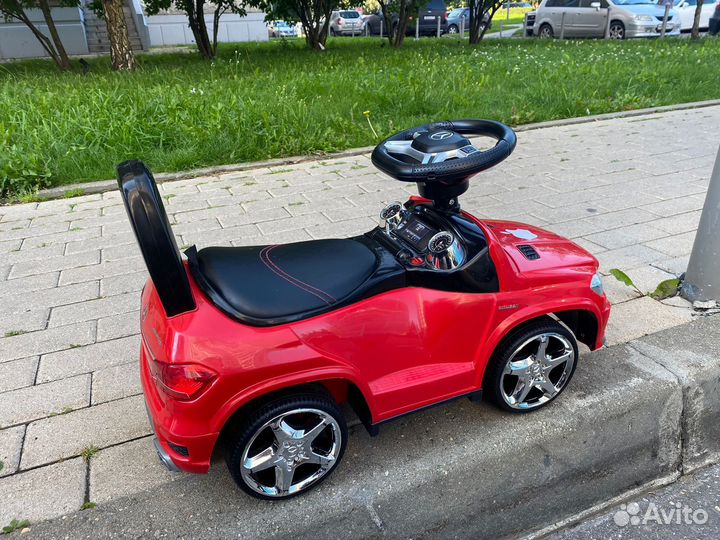Машинка-каталка с музыкой