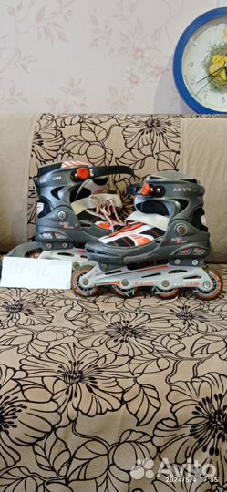 Роликовые коньки