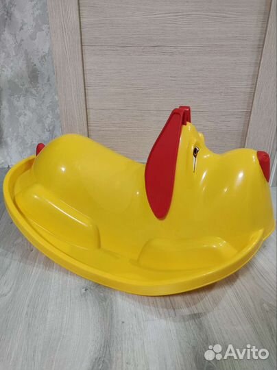 Собака качалка