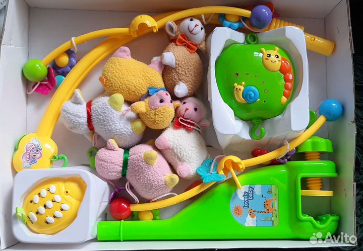 Мобиль в кроватку с проектором и 70 мелодиями