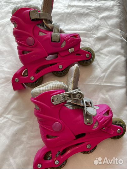 Роликовые коньки