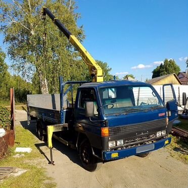 Бортовой грузовик Mazda Titan с КМУ ShinMaywa, 1995