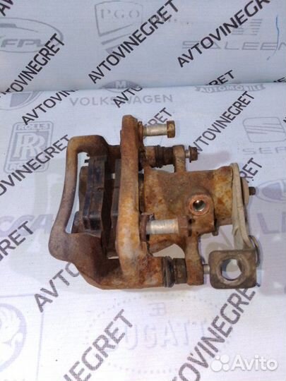 Суппорт тормозной задний левый Hyundai Solaris 1