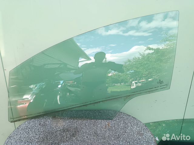 Стекло двери передней левой Ситроен Citroen-Peugeo