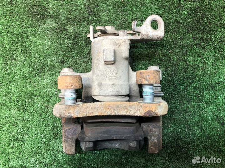 Суппорт тормозной задний левый Renault Fluence