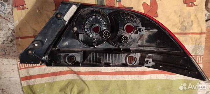 Задний фонарь lancer 9 левый