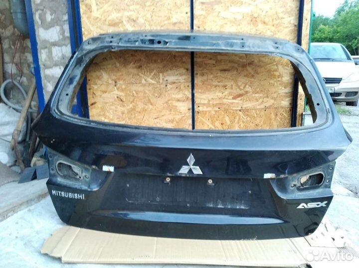 Крышка багажника Мицубиси асх 2011