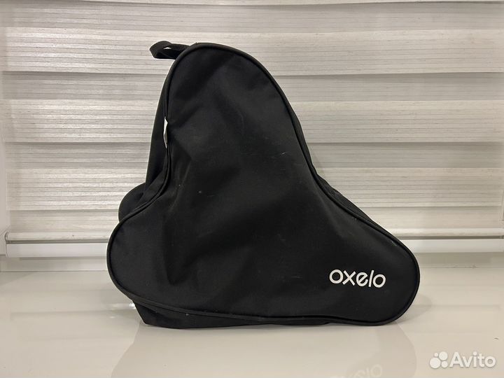 Роликовые коньки