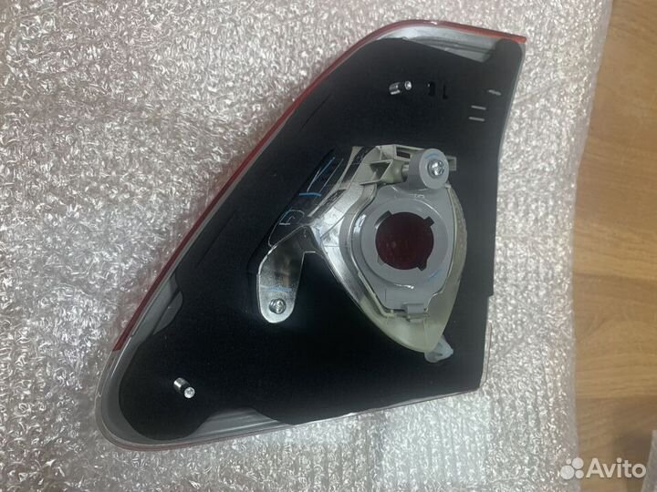 Фонарь внутренний левый оригинал Toyota Corolla