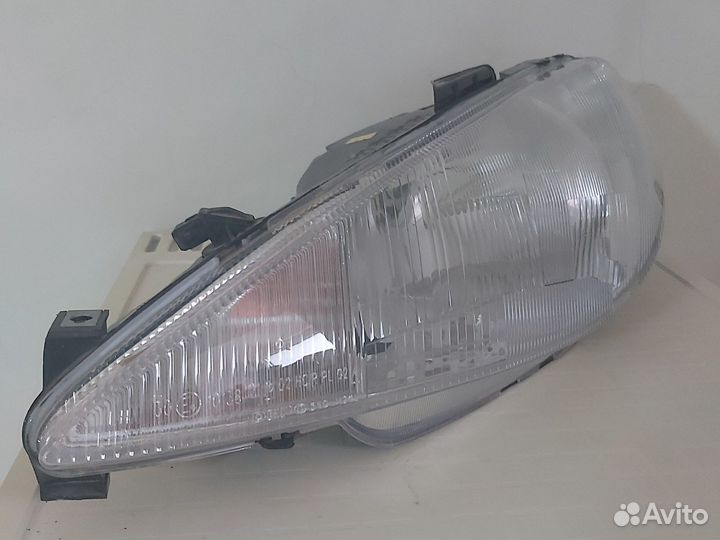 Фара левая peugeot 206