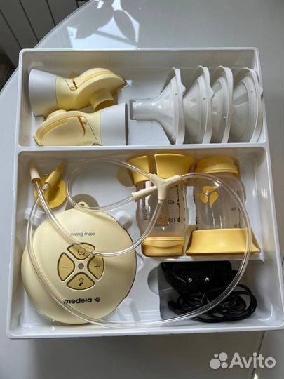 Молокоотсос medela swing maxi flex