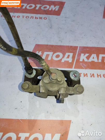 Суппорт тормозной задний левый Suzuki Grand Vitara