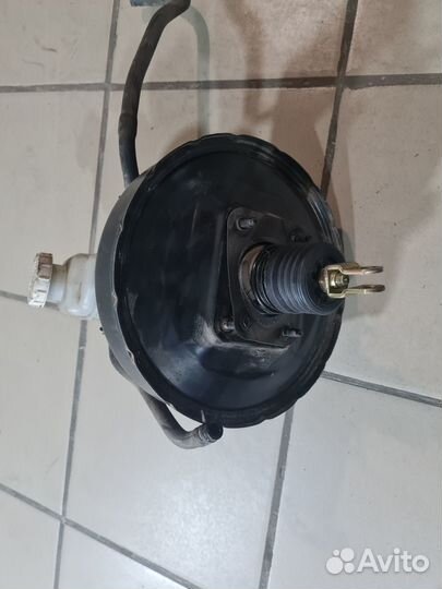 Вакуум главный тормозной цилиндр Mitsubishi Lancer