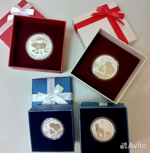 Монеты год Тигра,год Быка,год Свиньи серебро
