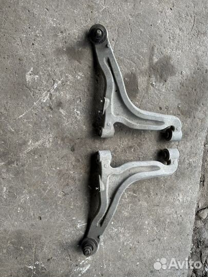 Cadillac srx задний рычаг