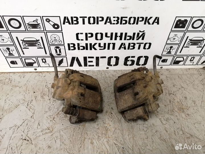 Суппорт тормозной передний Mitsubishi Colt Z3