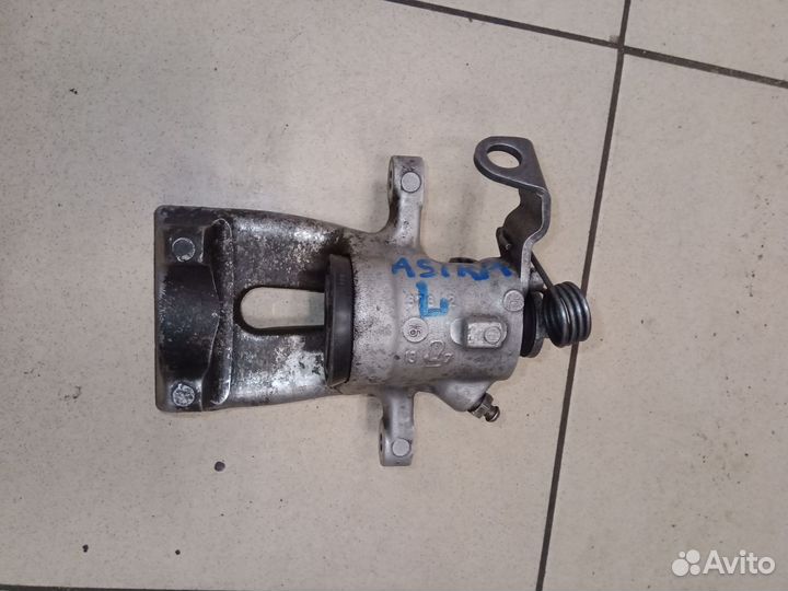 Суппорт opel astra задний