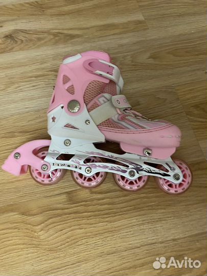 Роликовые коньки