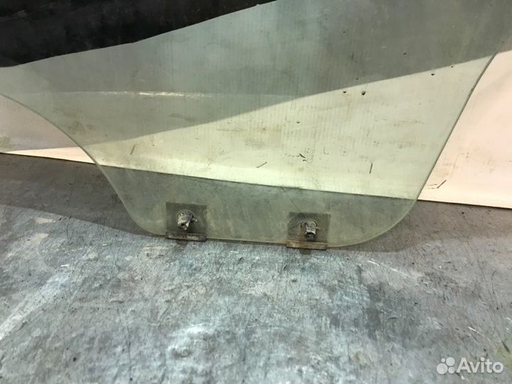 Стекло двери заднее левое Renault Logan K7MF710