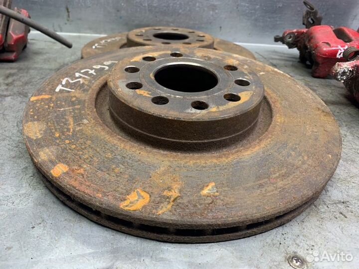 Суппорт тормозной задний левый Skoda Octavia (A5